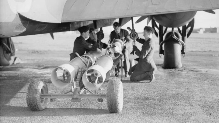 Crew loading bombs on a Mk. V Armstrong-Whitworth Whitley of RAF 502 (Ulster) Squadron at R.A.F. Aldergrove, Co. Antrim on 18th November 1940
