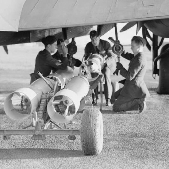 Crew loading bombs on a Mk. V Armstrong-Whitworth Whitley of RAF 502 (Ulster) Squadron at R.A.F. Aldergrove, Co. Antrim on 18th November 1940