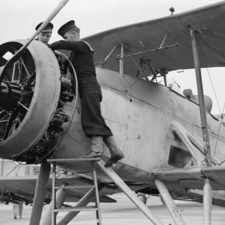 Naval ratings overhaul the engine of a Fairey Swordfish at R.A.F. Aldergrove, Co. Antrim on 17th November 1939