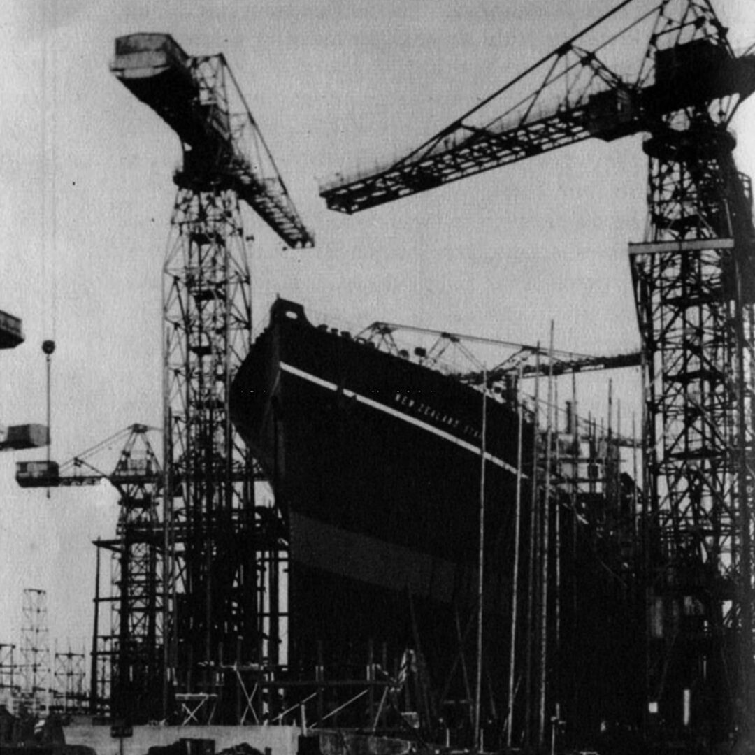 The shipbuilding yards of Belfast are among the very largest in the world. Before the war, when this picture was taken, giant liners, including the ill-fated Titanic, were launched here. Now the yards are busy day and night building ships of war.