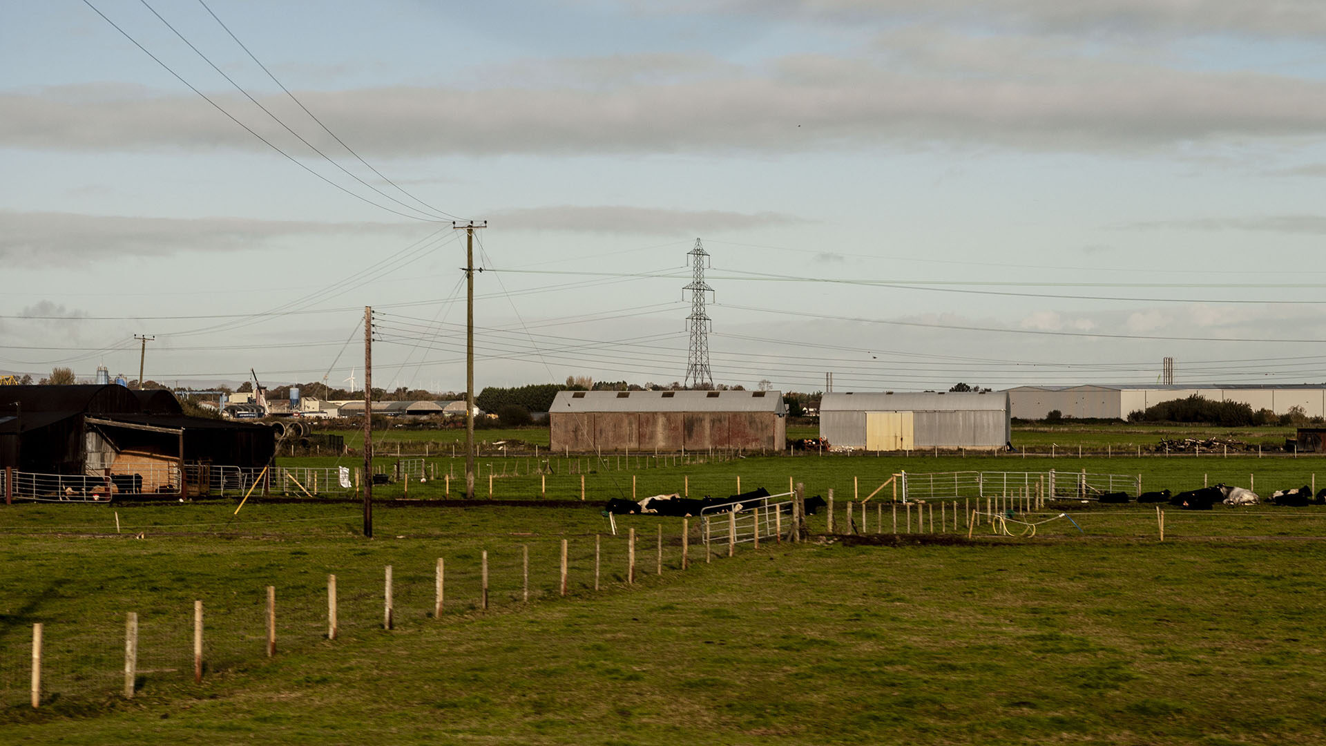 Agricultural and industrial buildings dominate the landscape at the site of the former Toome Airfield, Co. Antrim.