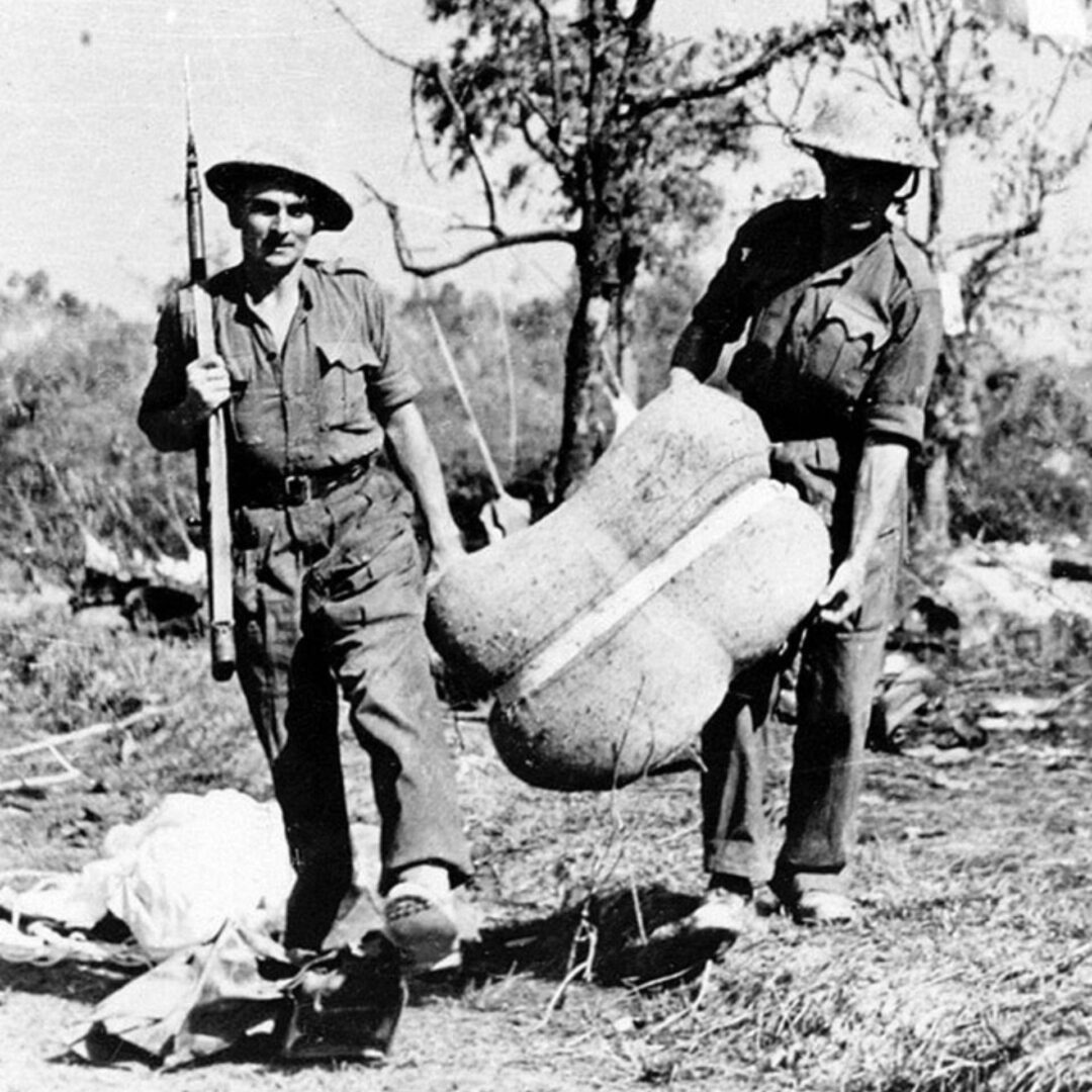British soldiers collect air-dropped supplies during the Battle of the Admin Box in February 1944.