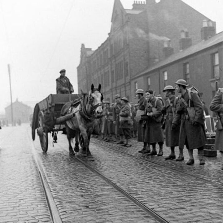U.S. Army troops watching a horse and cart in Belfast on 26th January 1942