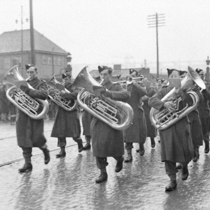 Band of the Royal Ulster Rifles leading U.S. Army troops in Belfast on 26th January 1942