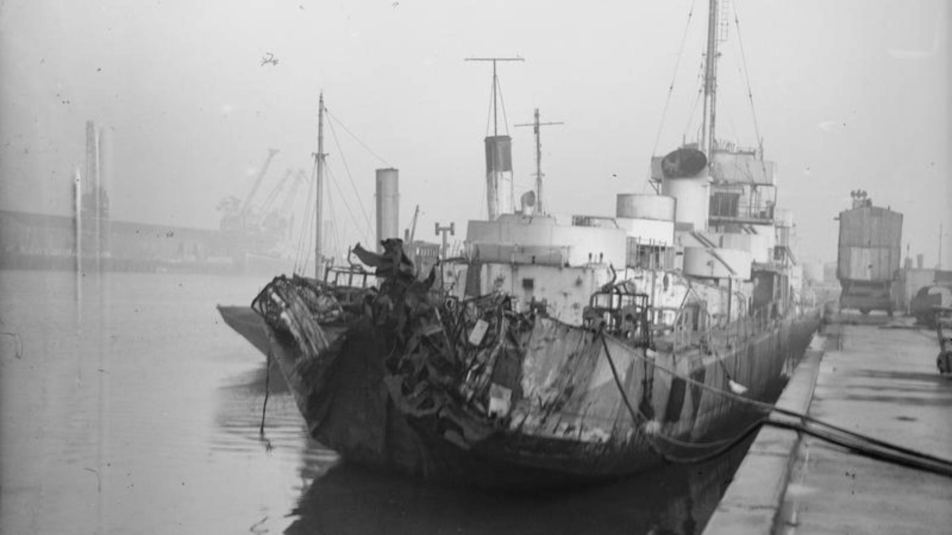 A Royal Navy Frigate with damaged stern docked in Pollock Dock, Belfast on 27th December 1942