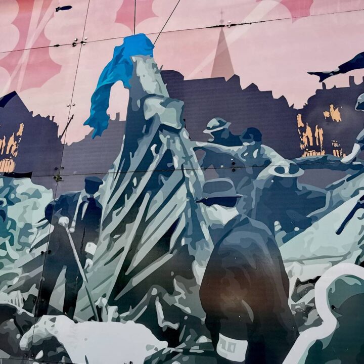 A mural depicting the death and destruction caused to the communities of northwest Belfast during the Luftwaffe raids of the Belfast Blitz in April and May 1941 on Dover Place, Belfast.