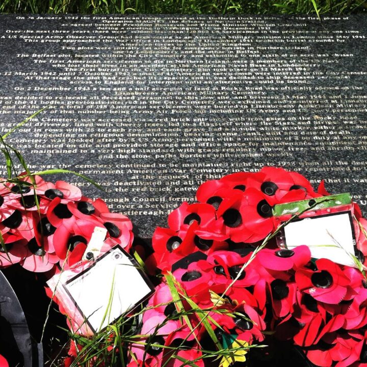 A commemorative plaque and poppy wreaths recall the service of the American service personnel who once lay in the former American Military Cemetery at Lisnabreeny, Belfast.