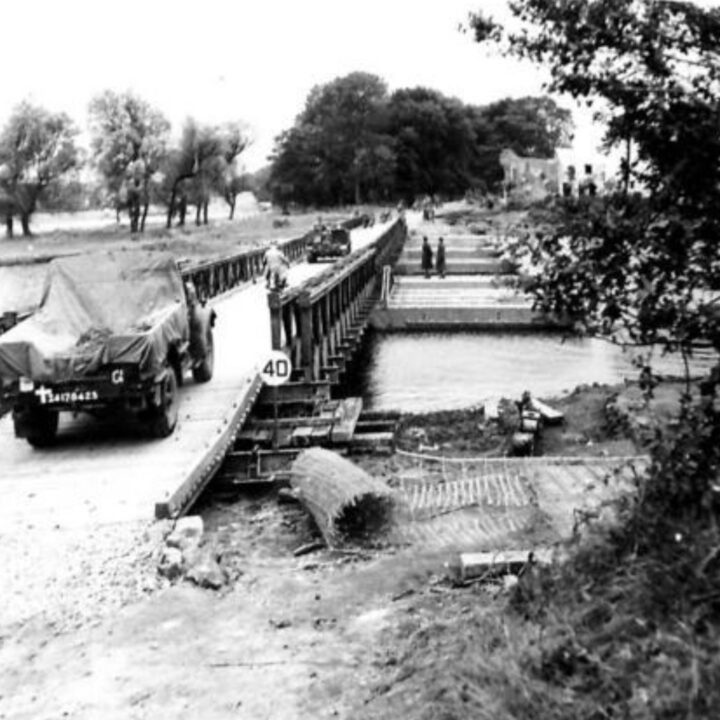 Vehicles of the British 45th Infantry Division crossing the water using a pontoon bridge during Exercise Judy at the River Bann, Newferry, Co. Antrim.