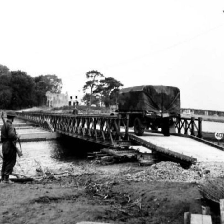 Lorries of the British 45th Infantry Division crossing the water using a pontoon bridge during Exercise Judy at the River Bann, Newferry, Co. Antrim.