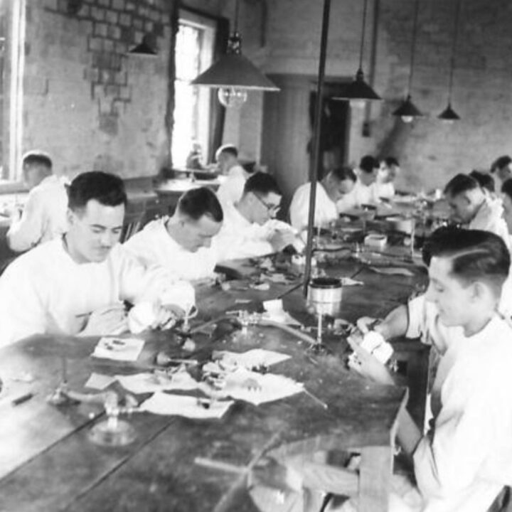 Dental Mechanics carrying out detailed work in the main laboratory at the Army Dental Laboratory, Palace Barracks, Holywood, Co. Down.
