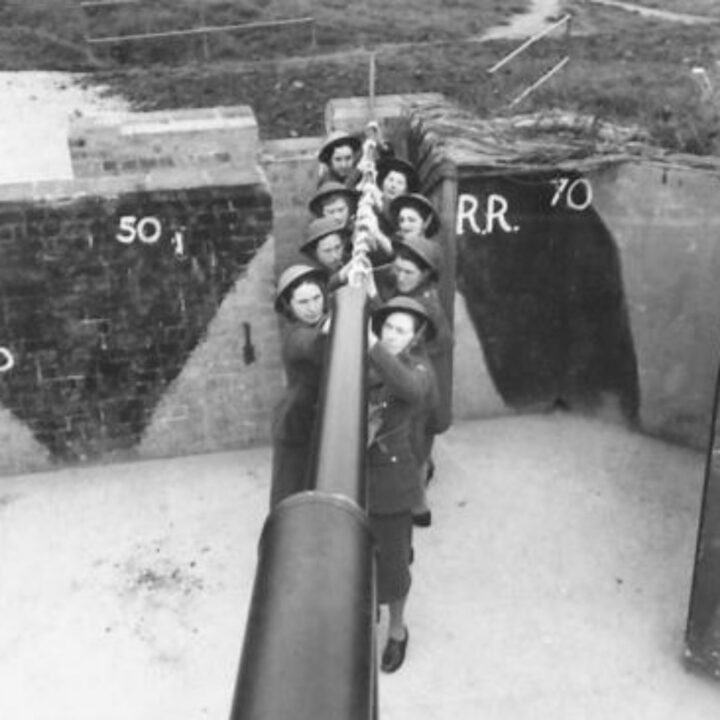 Members of the Auxiliary Territorial Service who contribute to the work of an Anti-Aircraft Battery visit the site to see how the guns work in Northern Ireland.