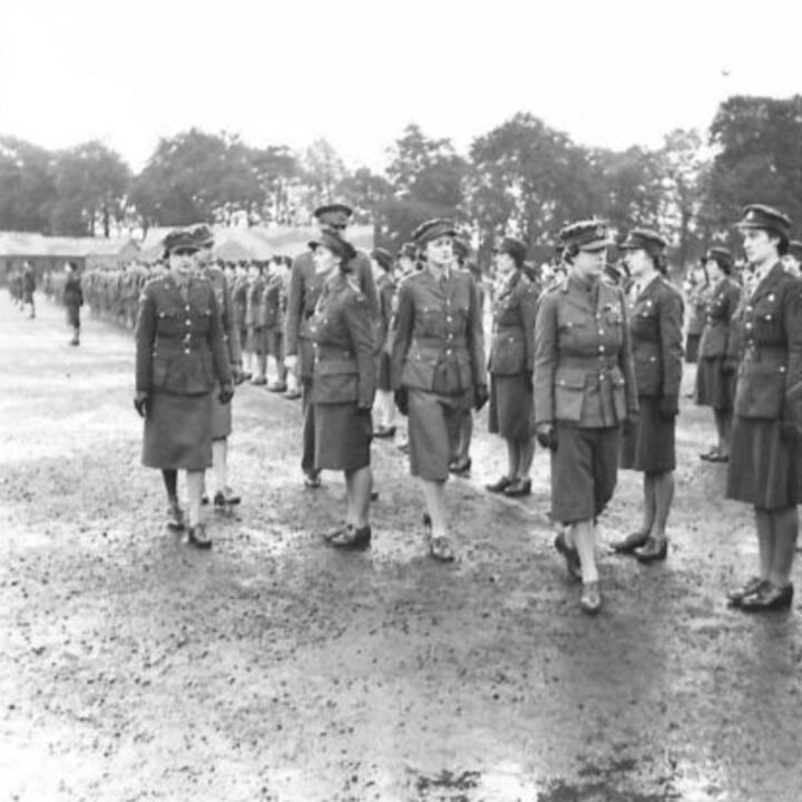 Her Royal Highness The Princess Royal (Colonel in Chief, Royal Corps of Signals) inspects members of the Auxiliary Territorial Service while inspecting 59th Division Signals in Northern Ireland.