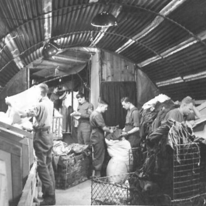 Soldiers sort out the washing at a Mobile Laundry Unit contained in large trailers, where more than 600 shirts per hour are washed in Northern Ireland.