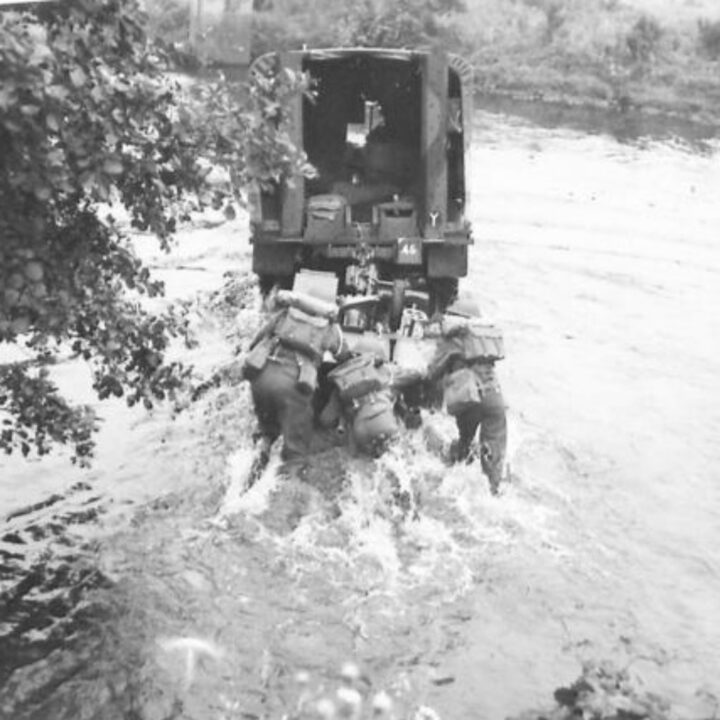 Members of an Anti-Tank Regiment demonstrate the use of a Portee Truck towing guns across a river during a training exercise in Northern Ireland.