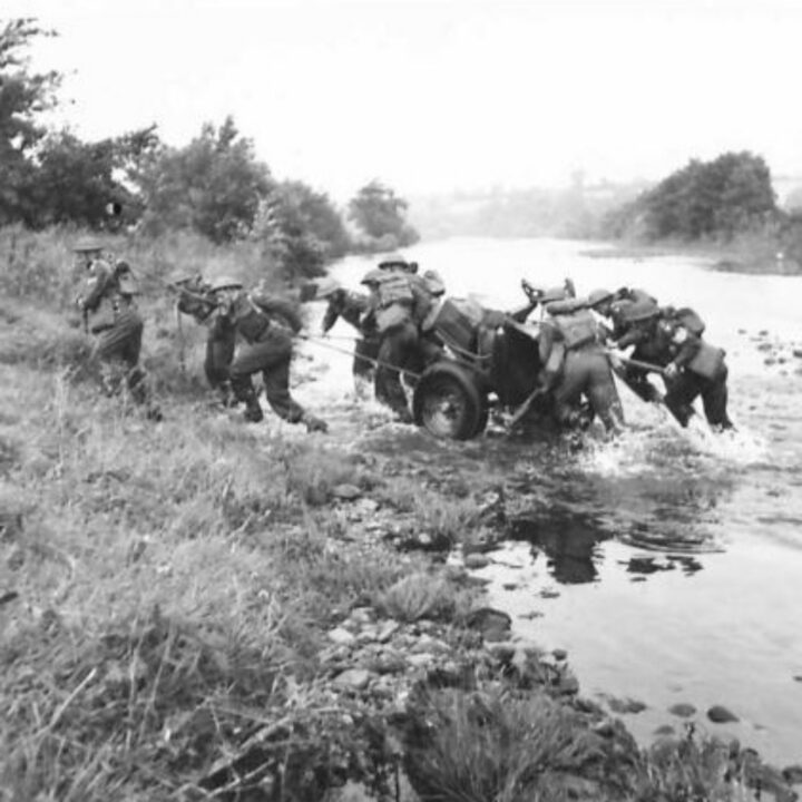Members of an Anti-Tank Regiment demonstrate methods of towing guns across a river during a training exercise in Northern Ireland.
