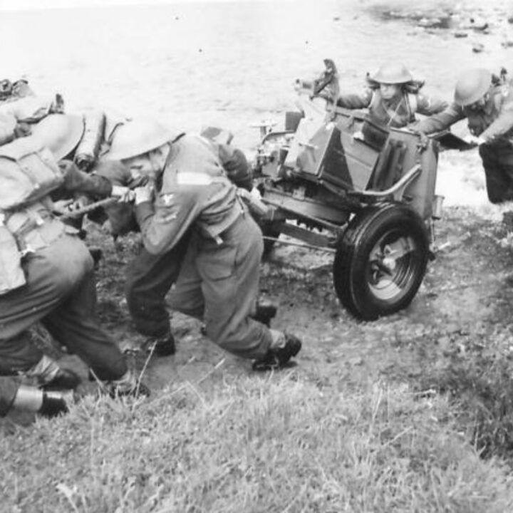Members of an Anti-Tank Regiment demonstrate methods of towing guns across a river during a training exercise in Northern Ireland.