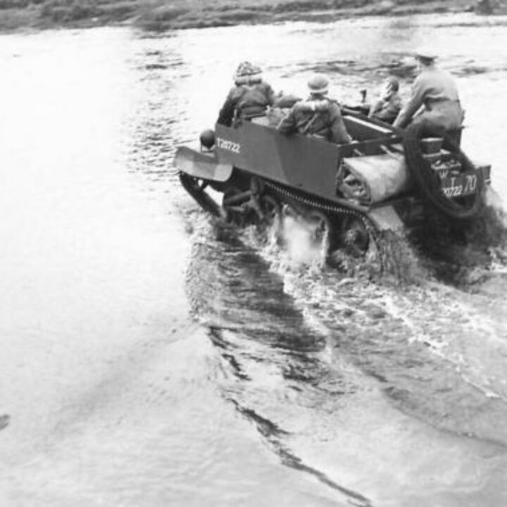 Members of 4th Battalion, Royal Berkshire Regiment, 148th Independent Infantry Group under the command of Lieutenant Colonel B. Hawkins practising new forms of attack and fording the River Maine on a Universal Carrier between Antrim Town and Ballymena, Co. Antrim.