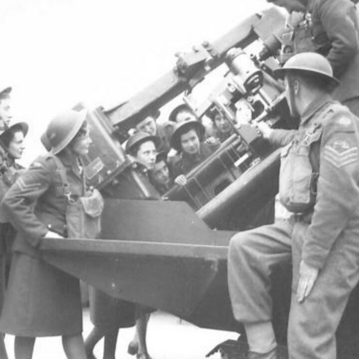 Members of the Auxiliary Territorial Service who contribute to the work of an Anti-Aircraft Battery visit the site to see how the guns work in Northern Ireland.