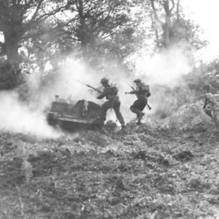 Members of the 6th Battalion, Royal Berkshire Regiment capture an 