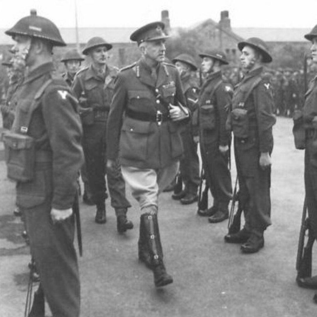 Lieutenant General Harold Edmund Franklyn C.B., D.S.O., M.C. (General Officer Commanding British Troops in Northern Ireland) and Company Commander Captain Hedley Verity inspect B Company, 1st Battalion, Princess Alexandra of Wales’ Own Yorkshire Regiment (The Green Howards) at Omagh, Co. Tyrone.