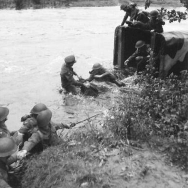 A British Army lorry gets in trouble crossing a river during an exercise by 208th Anti-Tank Battery, Royal Artillery at Lislap House, Gortin, Co. Tyrone.