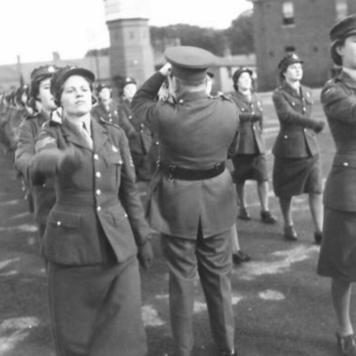 Staff Sergeant Mabel Kathleen Twist, thought to be the only person of her rank in Northern Ireland was commended by Auxiliary Territorial Service Chief Controller Jean Knox as the 'smartest woman in the A.T.S.'. A cinematographer films other members of the service at Northern Ireland District H.Q.