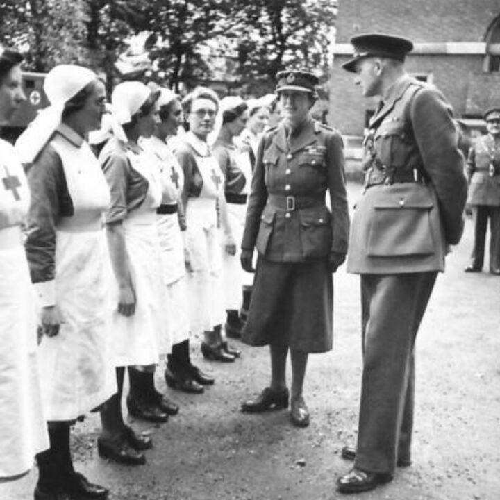 Her Royal Highness The Princess Royal with Lieutenant Colonel Grant (Commanding Officer of Stranmillis Military Hospital) meets Voluntary Aid Detachment nurses during an inspection at Stranmillis Military Hospital, Belfast.