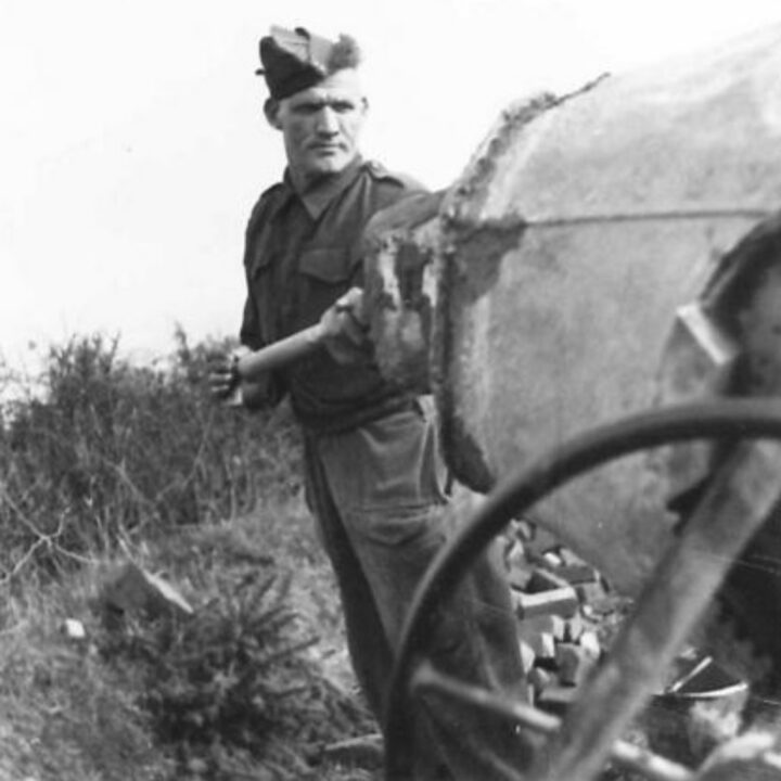 A member of The Pioneer Corps at work with a cement mixer in Northern Ireland.