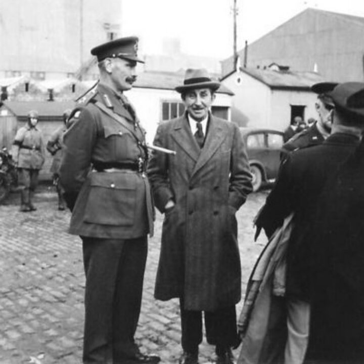 Major General John Keith Edwards D.S.O., M.C., and Sir Basil Brooke (Prime Minister of Northern Ireland) prepare to welcome a contingent of American troops to Belfast.
