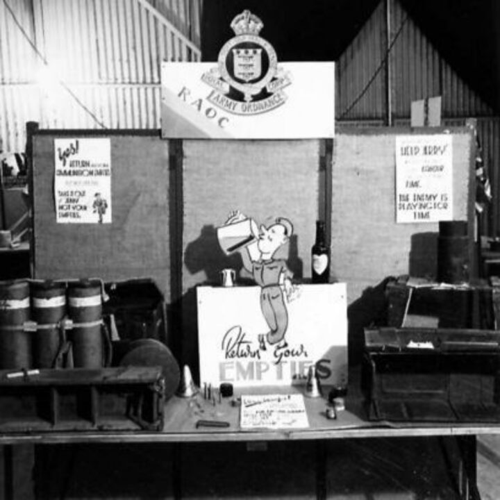 An exhibit stand encouraging the returning of ammunition empties at an Army Salvage Exhibition in Northern Ireland photographed for O.S.12 War Office.