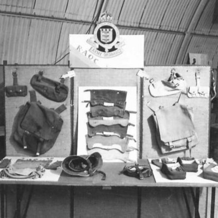 An exhibit stand of webbing equipment at an Army Salvage Exhibition in Northern Ireland photographed for O.S.12 War Office.