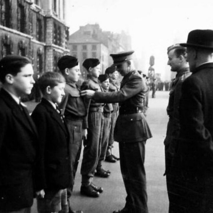 Major General Lord Bridgeman D.S.O., M.C. (Director General of the Home Guard) accompanied by Mr. J.H. Grummit (Headmaster of the Royal Belfast Academical Institution) during an inspection of a Cadet Battalion of the Royal Ulster Rifles at the Royal Belfast Academical Institution.