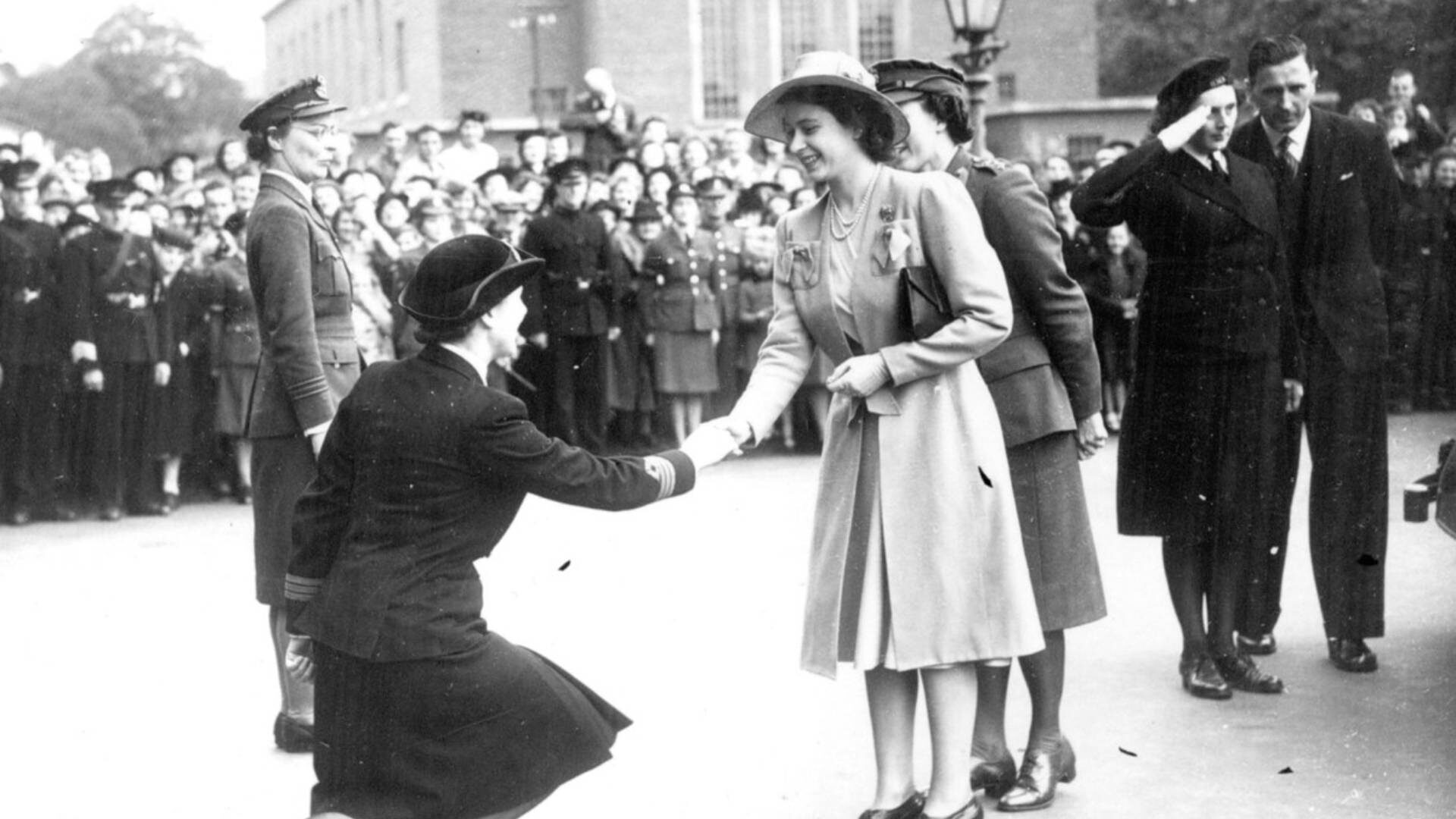 Princess Elizabeth meets with Chief Officer M.E. King of the Women's Royal Naval Service at Queen's University, Belfast. Photo taken on 18th July 1945.