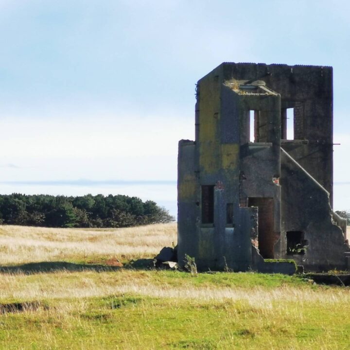 The Quadrant Tower at Carrowreagh, Co. Londonderry has lost some of its structure in the years following the Second World War but a significant amount remains on the Atlantic coast.
