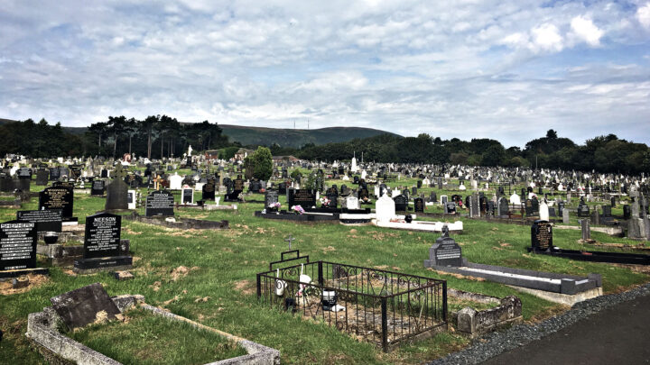 A view across Milltown Cemetery on the Falls Road in West Belfast looking towards the Belfast Hills.
