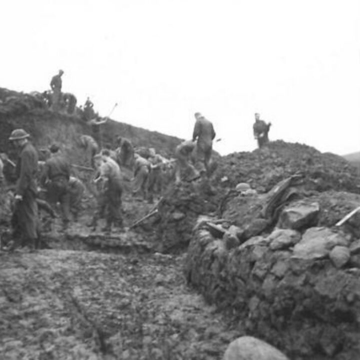 Members of the 61st Divisional Engineers cutting a new road through the Sperrin Mountains at Templemoyle, south of Dungiven, Co. Londonderry. Sappers at work.