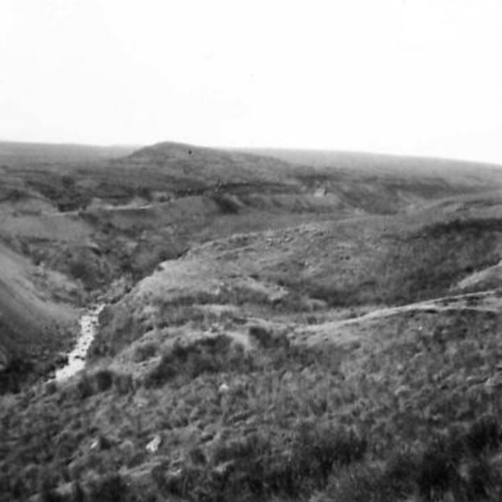 Members of the 61st Divisional Engineers cutting a new road through the Sperrin Mountains at Templemoyle, south of Dungiven, Co. Londonderry. Part 4 of 5 of a panorama of the winding road.