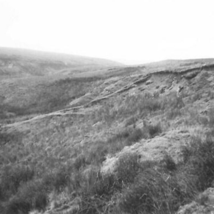 Members of the 61st Divisional Engineers cutting a new road through the Sperrin Mountains at Templemoyle, south of Dungiven, Co. Londonderry. Part 5 of 5 of a panorama of the winding road.