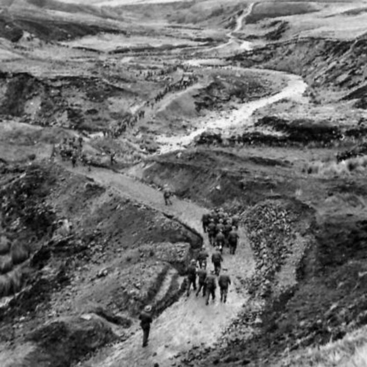 Members of 297, 582, 583, and 584 Companies, Kent Corps Troops, Royal Engineers cutting a new road through the Sperrin Mountains and Templemoyle, south of Dungiven, Co. Londonderry. A completed section of the new road.