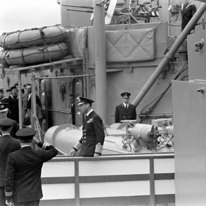 King George VI disembarks the Dido-class cruiser H.M.S. Phoebe on arrival at Musgrave Channel, Belfast.