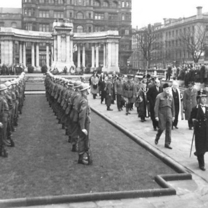 The official party leaves the Cenotaph at Belfast City Hall past a guard of honour of the Gloucestershire Regiment during the visit of M. Jan Masaryk (Deputy Prime Minister of Czechoslovakia) to Northern Ireland.