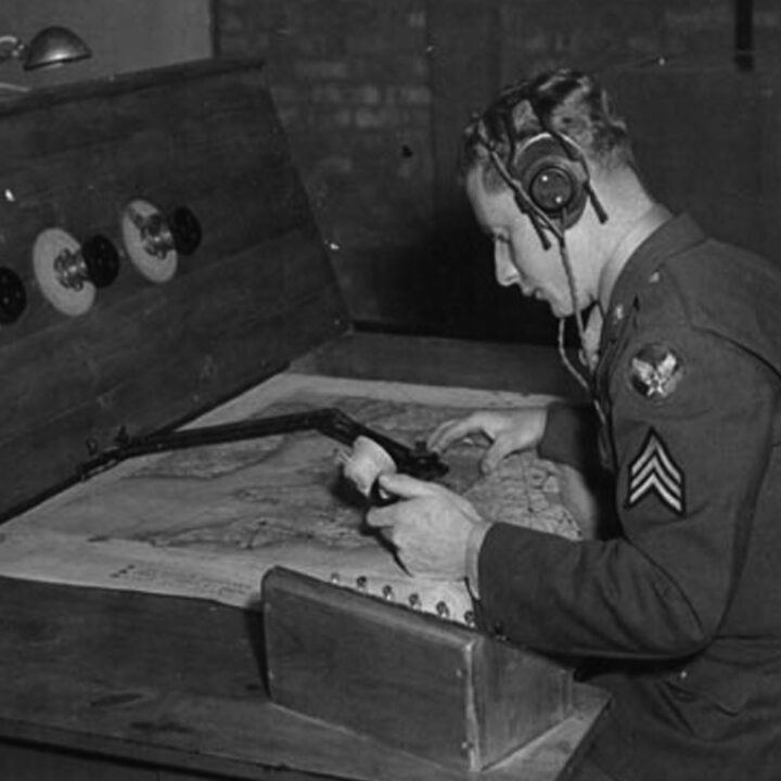 Sergeant Arnold Bohleber in the control room of a Grope Cubical Ground Station at U.S.A.A.F. Station 236, Toome Airfield, Co. Antrim on 21st September 1943.