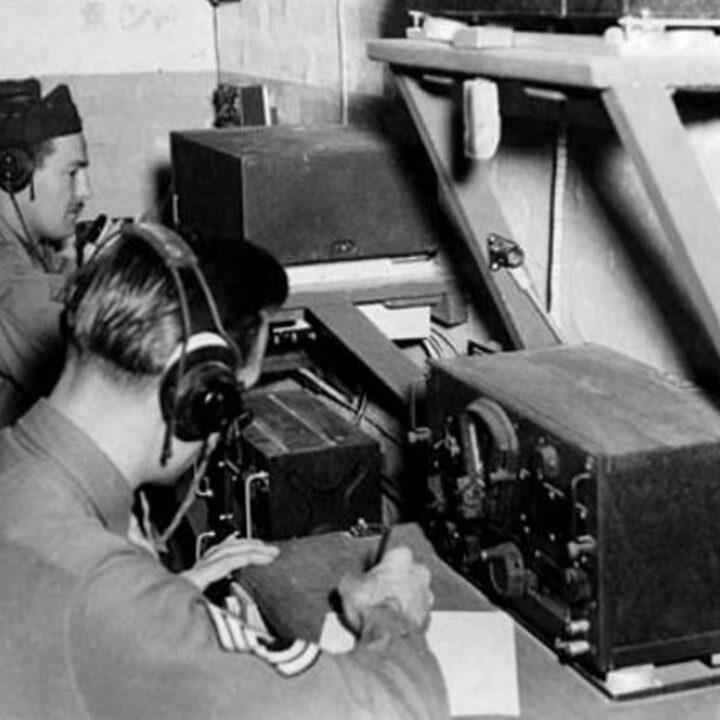 Radio Operators First Lieutenant Edmund Johnson and Technical Sergeant Michael Kruge in the control room of a Grope Cubical Ground Station at U.S.A.A.F. Station 236, Toome Airfield, Co. Antrim on 21st September 1943.