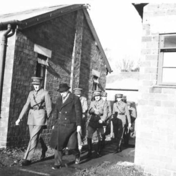 The Right Honourable Sir James Grigg K.C.B., K.C.S.I, P.C. (Secretary of State for War) inspects buildings and quarters at a British Army base in Northern Ireland.