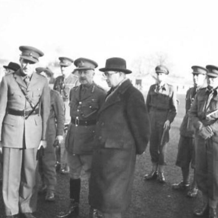 The Right Honourable Sir James Grigg K.C.B., K.C.S.I, P.C. (Secretary of State for War) with Lieutenant-Colonel G.H.K. Ryland (left) and Major General Vivian Henry Bruce Majendie C.B., D.S.O. (centre) at a British Army base in Northern Ireland.