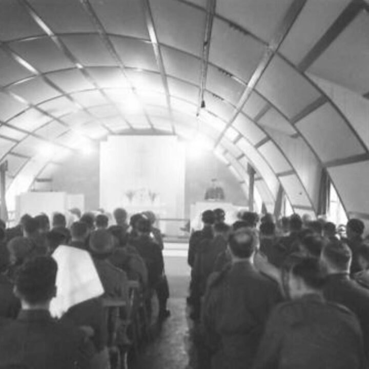 Reverend L.F. Hamel-Smith M.A. (Senior Chaplain to the Forces, Northern Ireland District) conducts a dedication service of a new chapel at a military hospital in Northern Ireland. The Commanding Officer at the hospital read the Bible lesson.