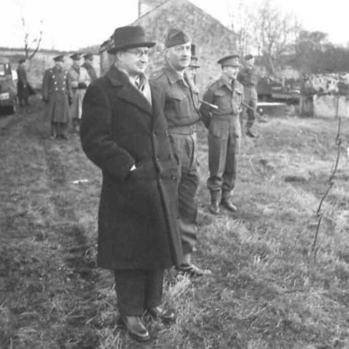 The Right Honourable Sir James Grigg K.C.B., K.C.S.I, P.C. (Secretary of State for War) and Officers observing training at a British Army Battle School in Northern Ireland.