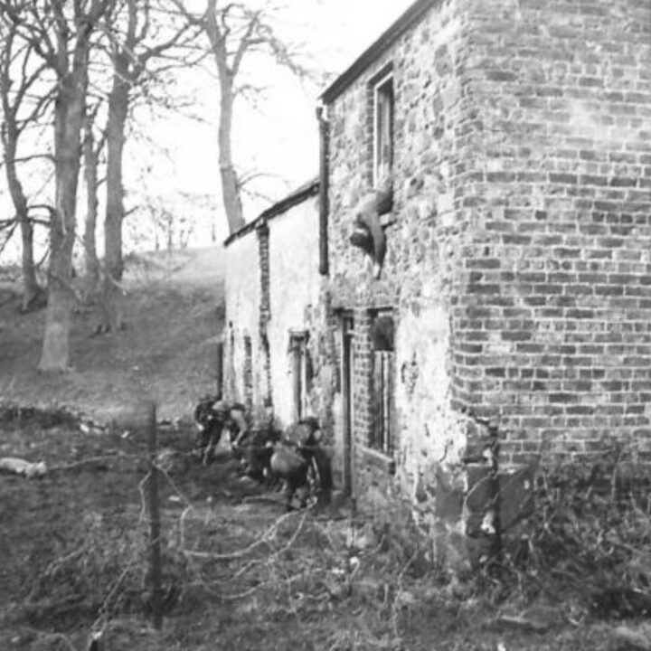 Soldiers of the British Army enter a disused farmhouse as part of a training exercise, clearing it of ‘the enemy’ at a Battle School in Northern Ireland.