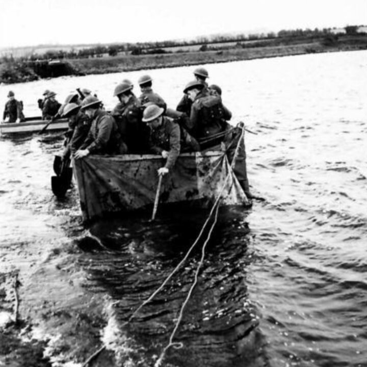 Soldiers of 72nd Independent Infantry Brigade, British Army construct a raft using an iron frame and a waterproof lorry cover at Corbet Lough near Banbridge, Co. Down. The new style of water-crossing enabled soldiers to transport a 30 CWT lorry, a Jeep, and an Anti-Tank Gun.