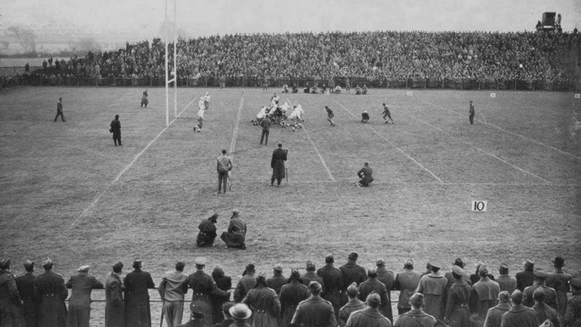 United States military teams 'Yarvard' and 'Hale' compete in the first game of American Football played in the European Theater of Operations during the Second World War. 'Hale' won the encounter 9-7 at Ravenhill Stadium, Belfast on 14th November 1942.